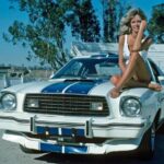 Farrah Fawcett on her Ford Mustang II POSTER 24 X 36 INCH SWEET!